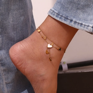 Double-layered gold anklet with heart pendants and white shell tassel for women