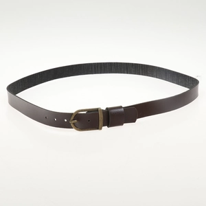 Detail of dark brown leather belt featuring an antique bronze buckle and fine texture