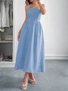 Detailed texture view of a blue strapless A-line midi dress with high-quality fabric