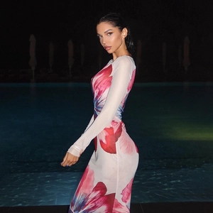 Close-up of sexy sheer mesh floral print on long sleeve bodycon dress for women