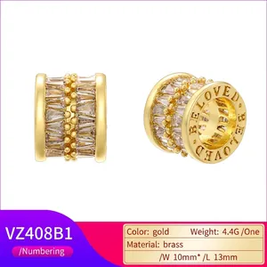 Gold-plated brass barrel charms with cubic zirconia and 'BELOVED' engraving details