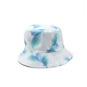 Reversible bucket hat with blue-green gradient feather pattern for outdoor sun protection