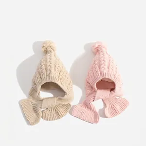 Winter knit hooded scarf for toddlers with pom-poms in beige and pink cable knit style