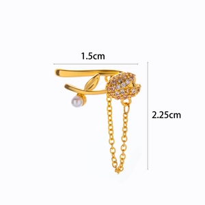 Detail of gold flower ear cuff with pearls and crystals showing 1.5cm by 2.25cm size