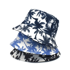 Women's summer bucket hat with tropical palm leaf print in navy, blue and black