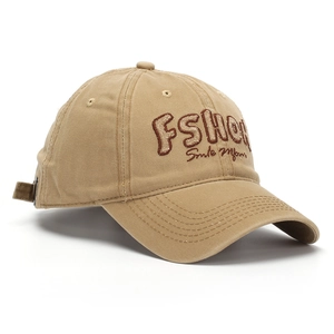 Close-up of khaki baseball cap with brown Smile More embroidery and premium stitching