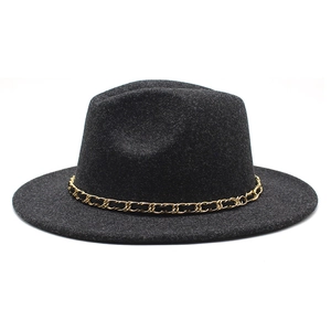 Detail of premium black wool felt fedora featuring a decorative gold metal chain band