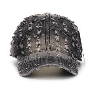 Distressed dark grey washed denim baseball cap with vintage frayed rips and curved brim