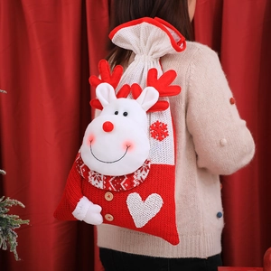 Grande sacchetto regalo di Natale in maglia con motivo renna e chiusura a coulisse festiva