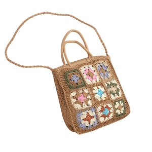 Handmade crochet straw tote bag with colorful floral checkered patterns and dual straps