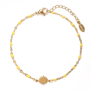 Detail of stainless steel sun charm bracelet with gold chain and yellow seed beads