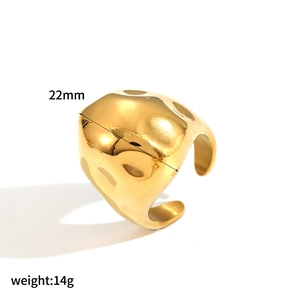Detail view of 22mm 18k gold plated stainless steel ring with hammered lava texture