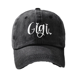 Washed dark grey cotton baseball cap with white Gigi embroidery and heart detail