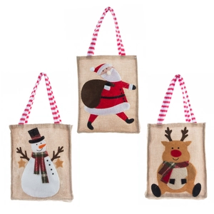 Trois sacs cadeaux de Noël en toile de jute avec bonhomme de neige, Père Noël et renne