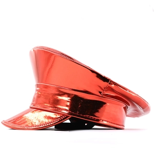 Close-up of shiny laser PU leather military hat in metallic red for parties and stage