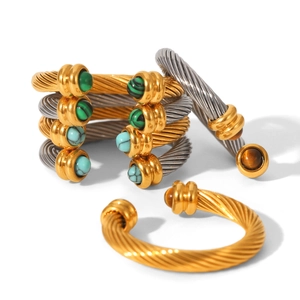 Bracelet jonc torsadé en acier inoxydable avec embouts ornés de pierres colorées
