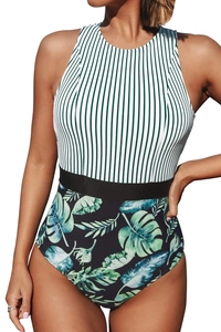 Detailed front view of high-neck one-piece swimsuit with striped top and tropical leaf print