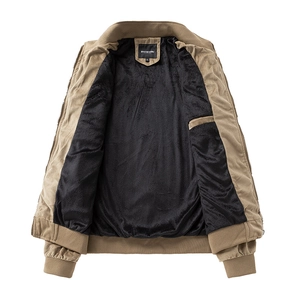 Close-up of suede jacket with warm black fleece lining and interior hidden pocket detail