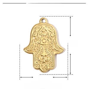Detailed view of gold plated Hamsa hand pendant showing dimensions 23mm by 16mm