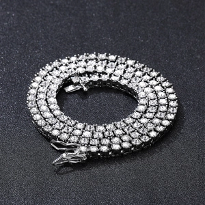 Classic silver tennis chain necklace featuring brilliant round-cut inlaid cubic zirconia gems