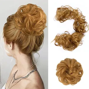 Detailed messy bun scrunchie in golden brown hair fiber with curly wrap design