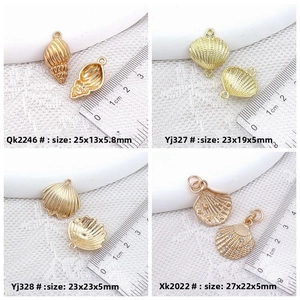 Detailed view of ocean shell alloy pendants in gold finish with precise size measurements