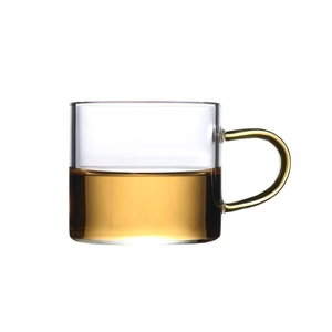 Borosilicate glass teacup with amber handle and heat-resistant transparent body