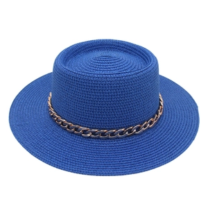 Elegant bright blue French boater straw hat with a decorative metallic gold chain.