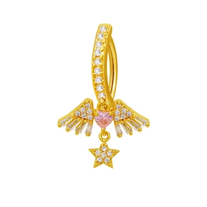 Macro detail of gold belly ring with pink heart gem, diamond wings and star pendant