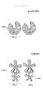 Detailed tile display of silver steel earrings with precise weight and size measurements