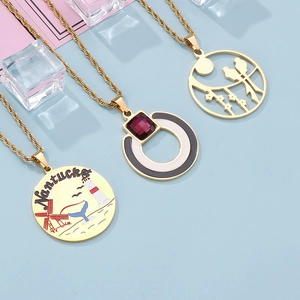 Golden geometric pendants with lighthouse and bird designs on titanium steel twist chains