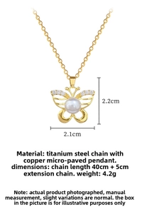 Detail of gold butterfly pearl pendant with cubic zirconia inlay on a titanium steel chain