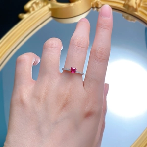 925 sterling silver ring with heart shaped red gemstone and micro paved white crystals