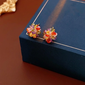 Exquisite cluster flower stud earrings with colorful crystals on a gold base