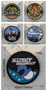 Detailed macro view of high-density embroidery mountain patches for outdoor gear
