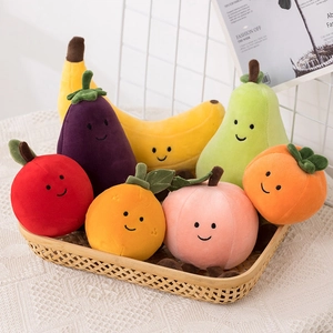 Set of colorful plush fruit and vegetable toys with cute faces in a woven basket