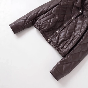 Women quilted PU leather jacket in brown with stylish snap buttons and elastic hem