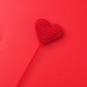 Handmade red crochet heart flower bouquet with knitted stem for gift giving