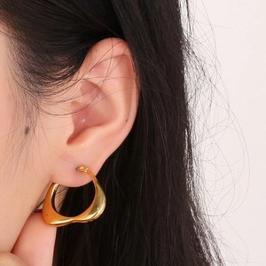 French vintage irregular gold geometric C-shaped hoop earrings in polished finish