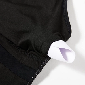Detail of high-waist swimsuit with mesh panels and removable padded bra cups design