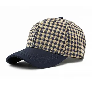 Classic houndstooth baseball cap with navy brim and structured six-panel crown