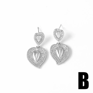 Sparkling silver double heart drop earrings with white cubic zirconia inlay