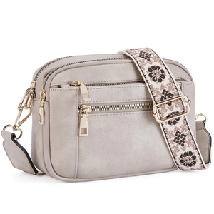 Grey PU leather crossbody bag featuring multiple zippers and floral printed wide strap