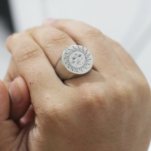 Men's 22mm stainless steel signet ring featuring engraved sun and moon totem graphics