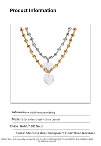 Double-layered beaded chain necklace with clear heart pendant in gold and silver finish