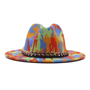 Detail of colorful graffiti wool felt jazz hat featuring elegant rose gold metal chain