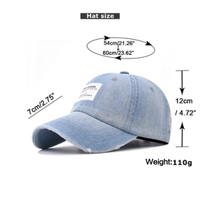 Detailed size chart for washed blue denim baseball cap with height and weight specs