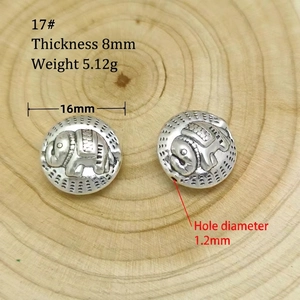 Macro view of 16mm silver elephant relief bead with detailed size specifications