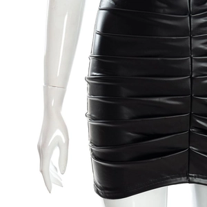 Detailed view of black PU leather skirt featuring horizontal pleats and glossy finish