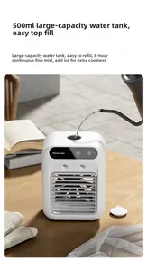 Detail showing water being poured into the 500ml top-fill tank of a white pet cooling fan
